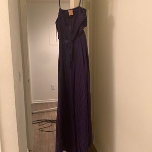 Blue jumpsuit with fine white line open back